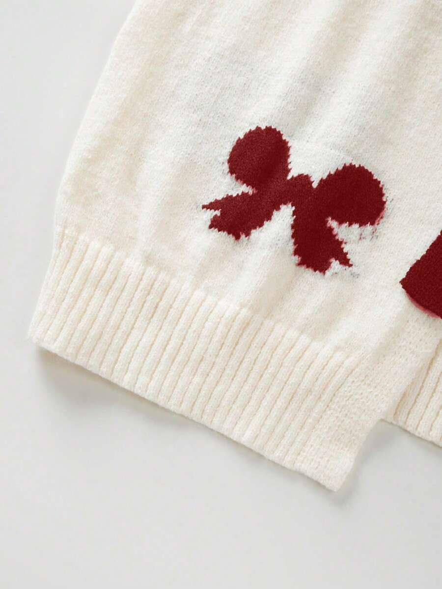 sweter długi rękaw wiązanie wzór kokardy
