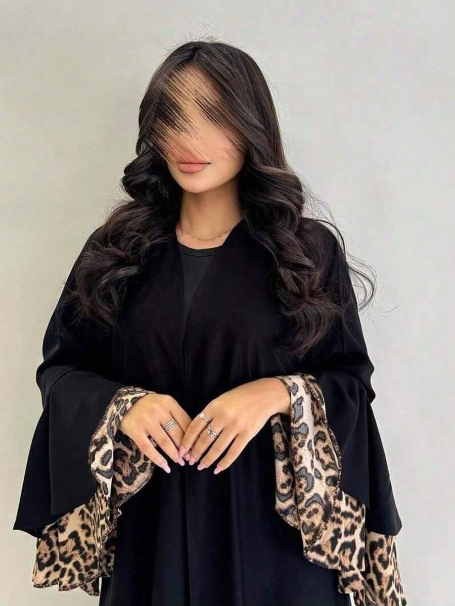 czarna narzutka łączenie animal print