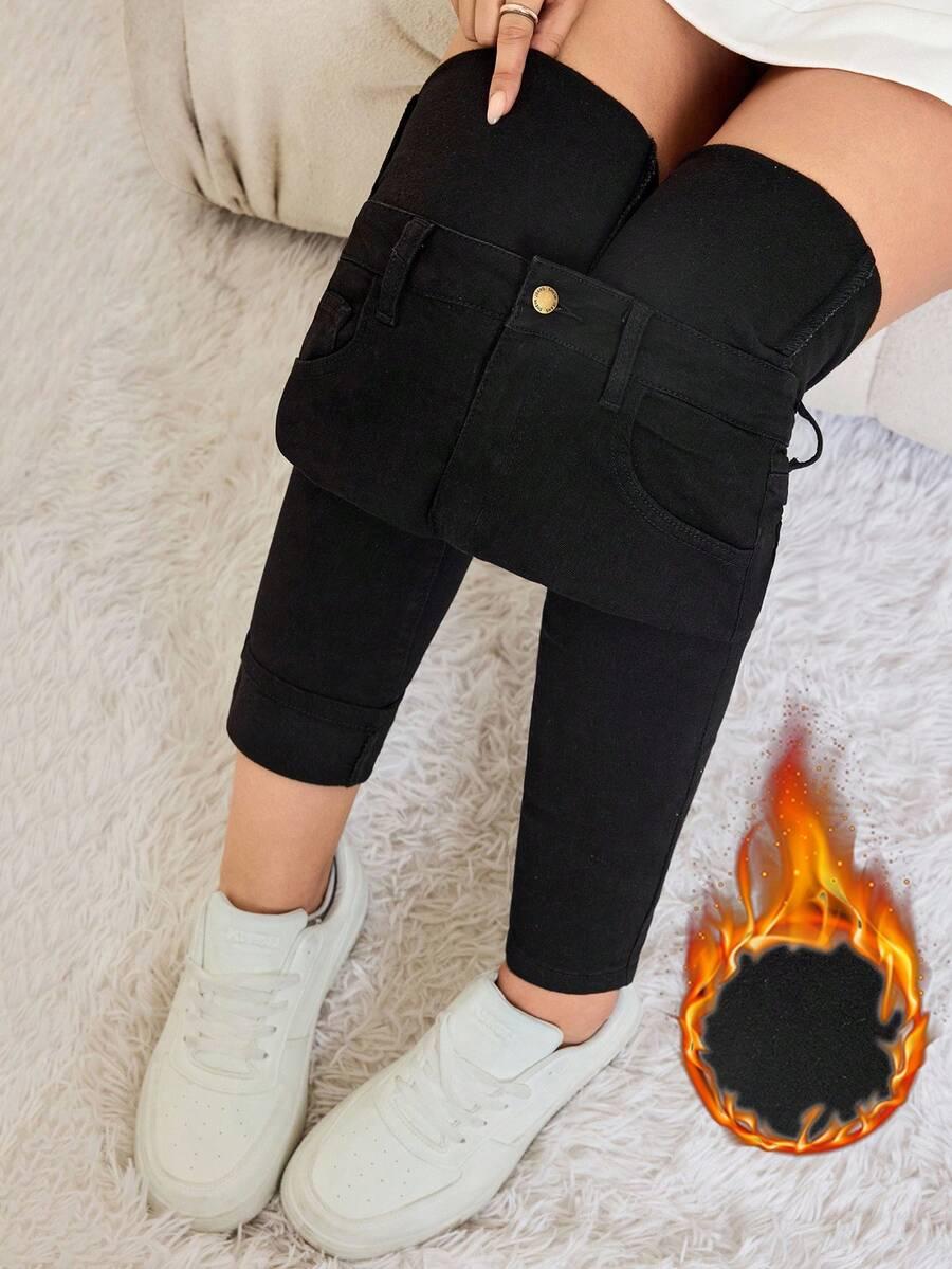 czarne ocieplane spodnie jeans