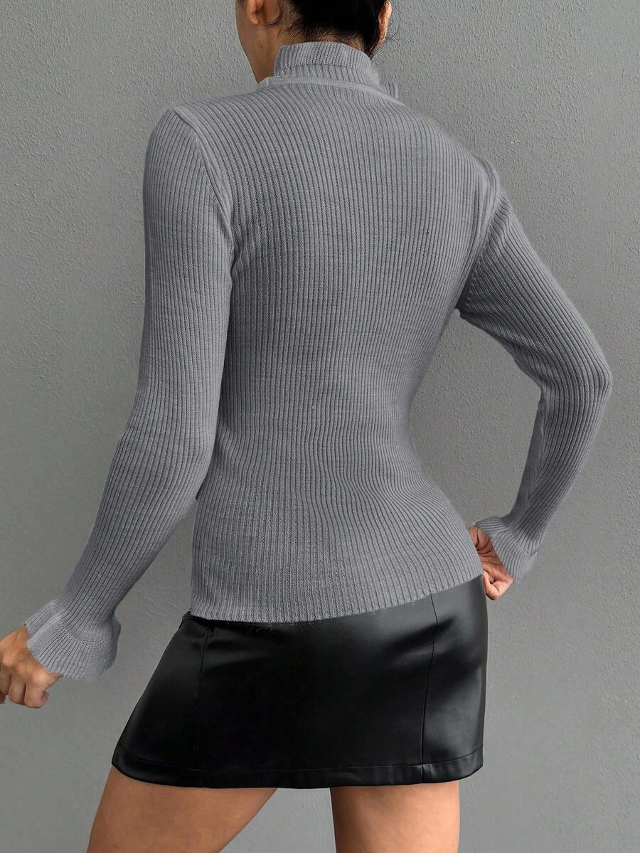 różowy sweter prążki falbanki