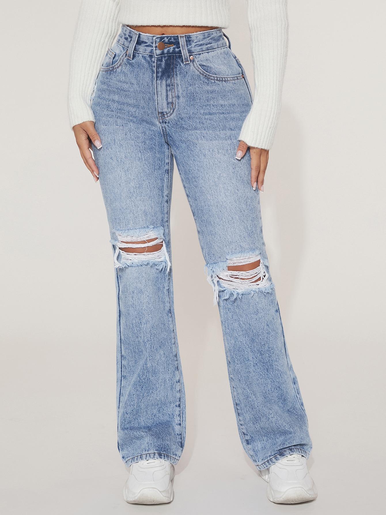 niebieskie spodnie jeans przetarcia
