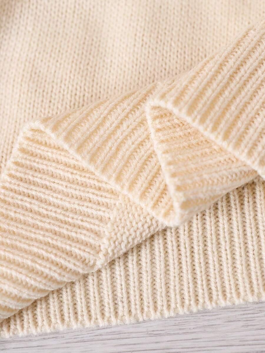 BEŻOWY SWETER GUZIKI