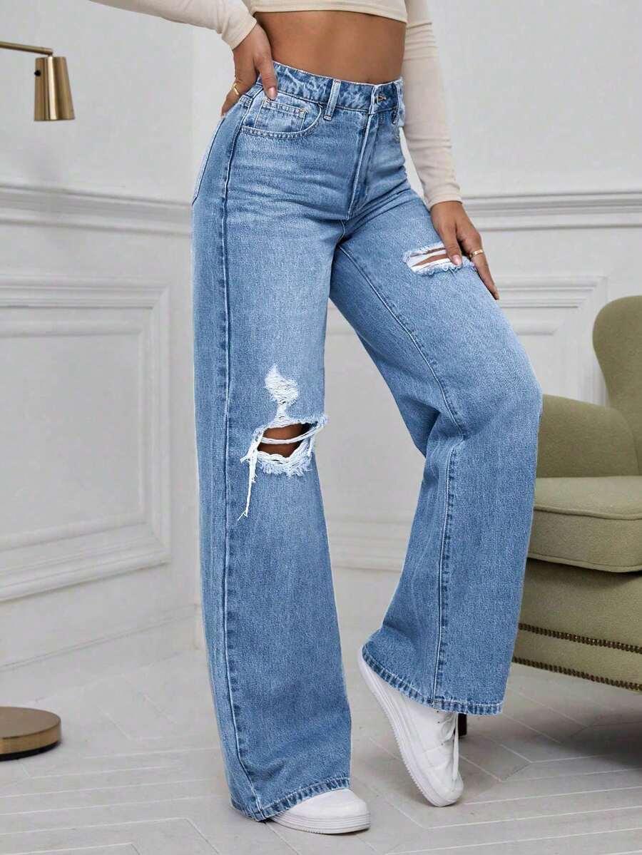 SPODNIE JEANS PRZETARCIA 