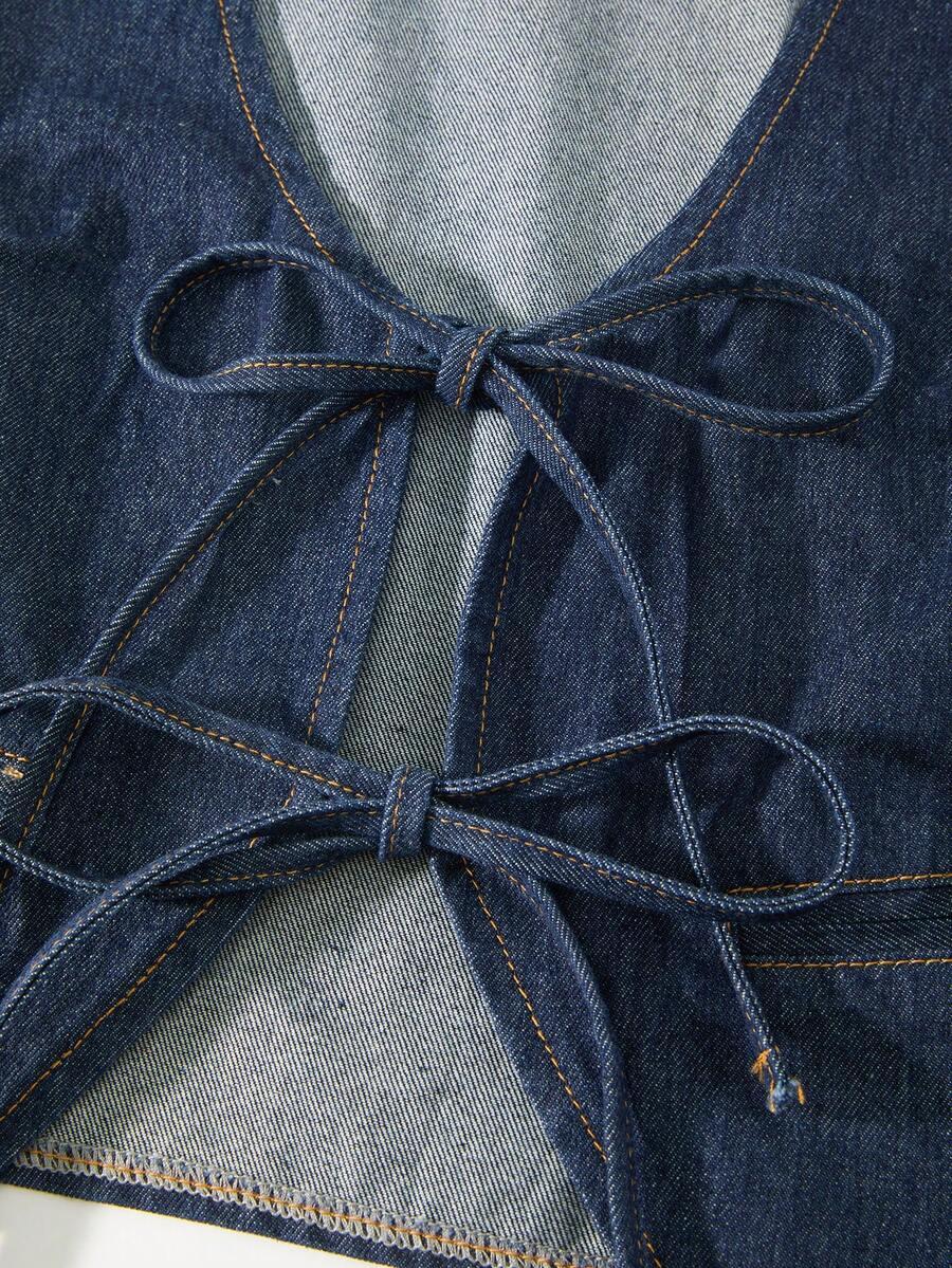 niebieska kamizelka jeans