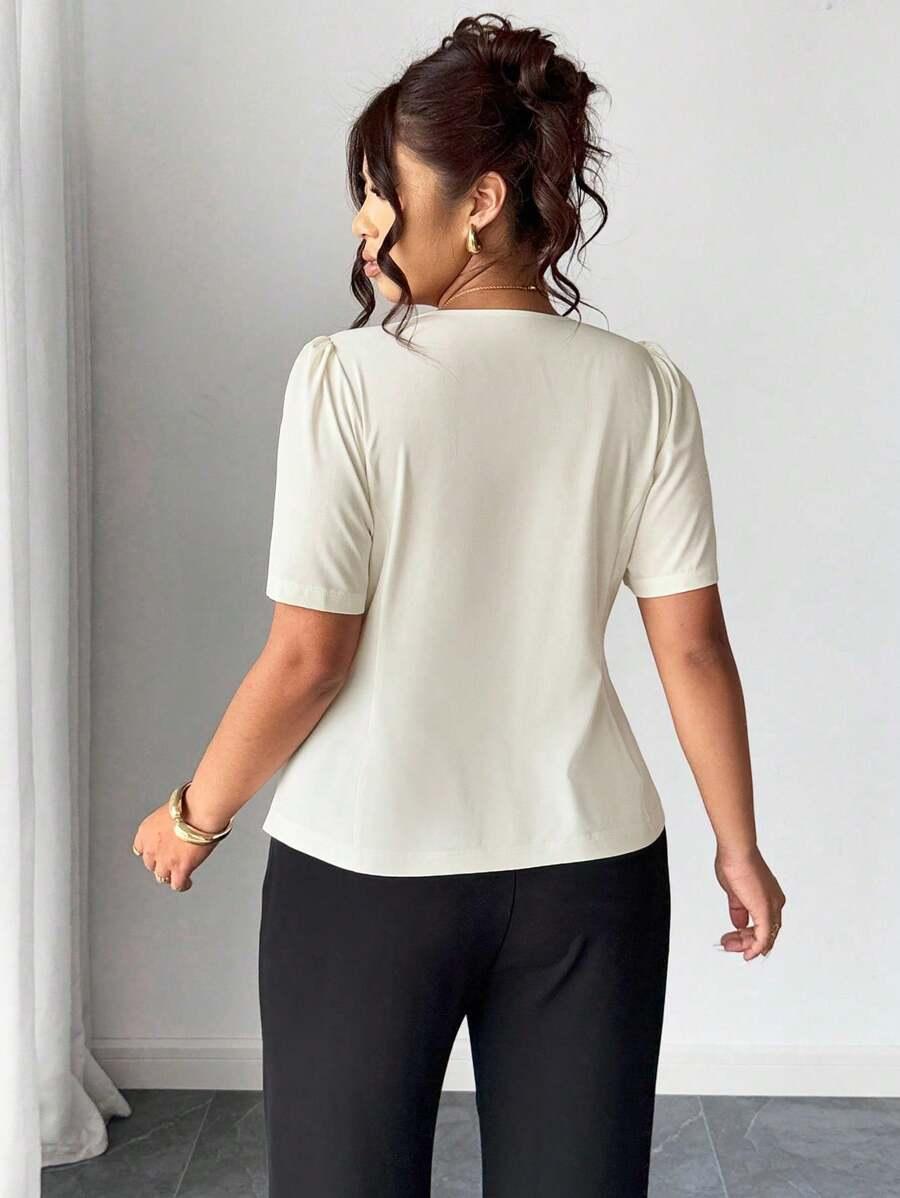 BLUZKA Z KRÓTKIM RĘKAWEM ZDOBIENIE V NECK