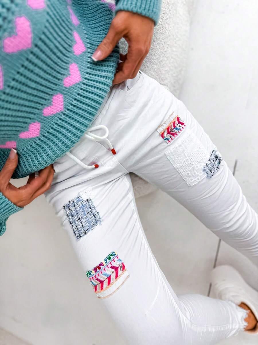 BIAŁE SPODNIE JEANS