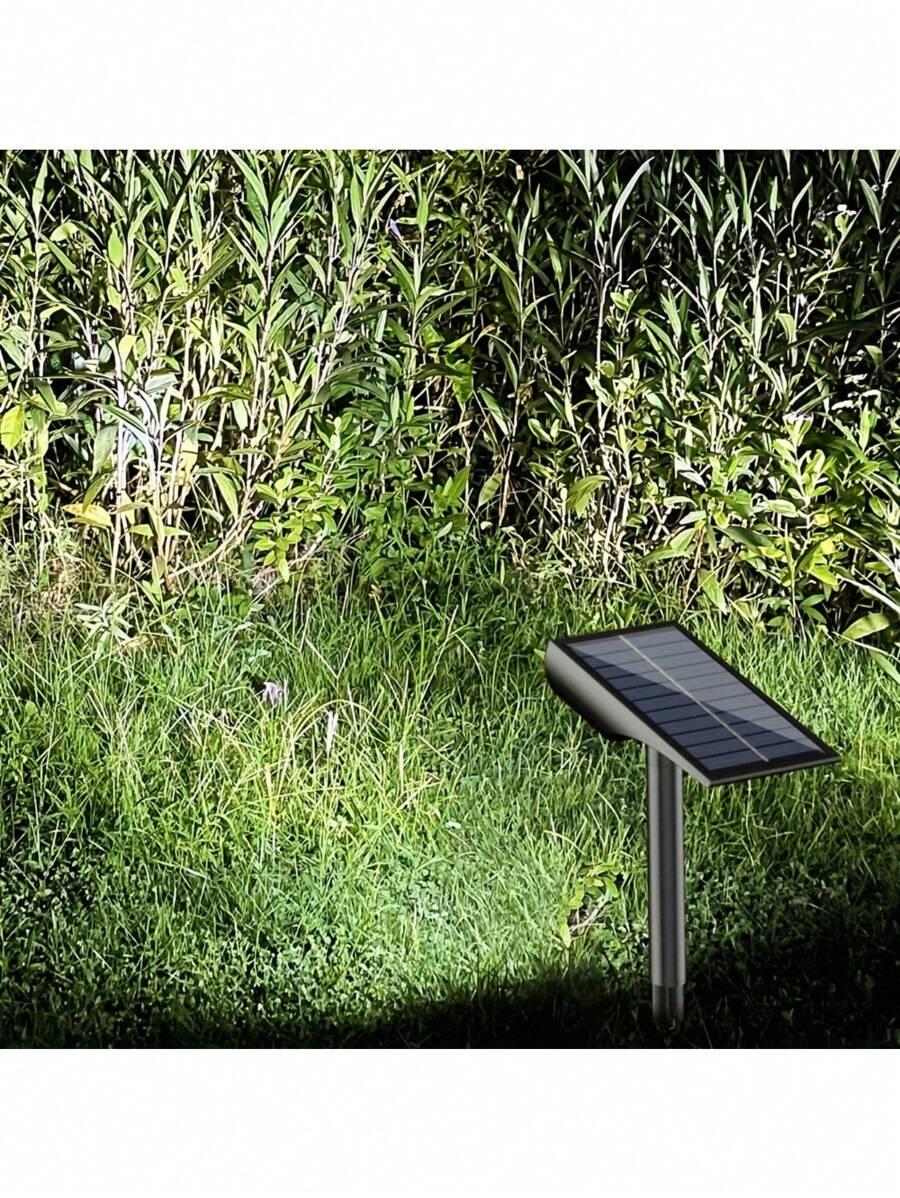 czarna lampka solarna wbijana