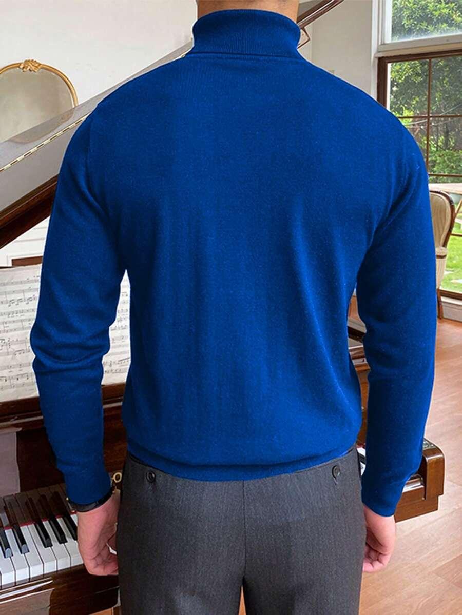 niebieski sweter golf
