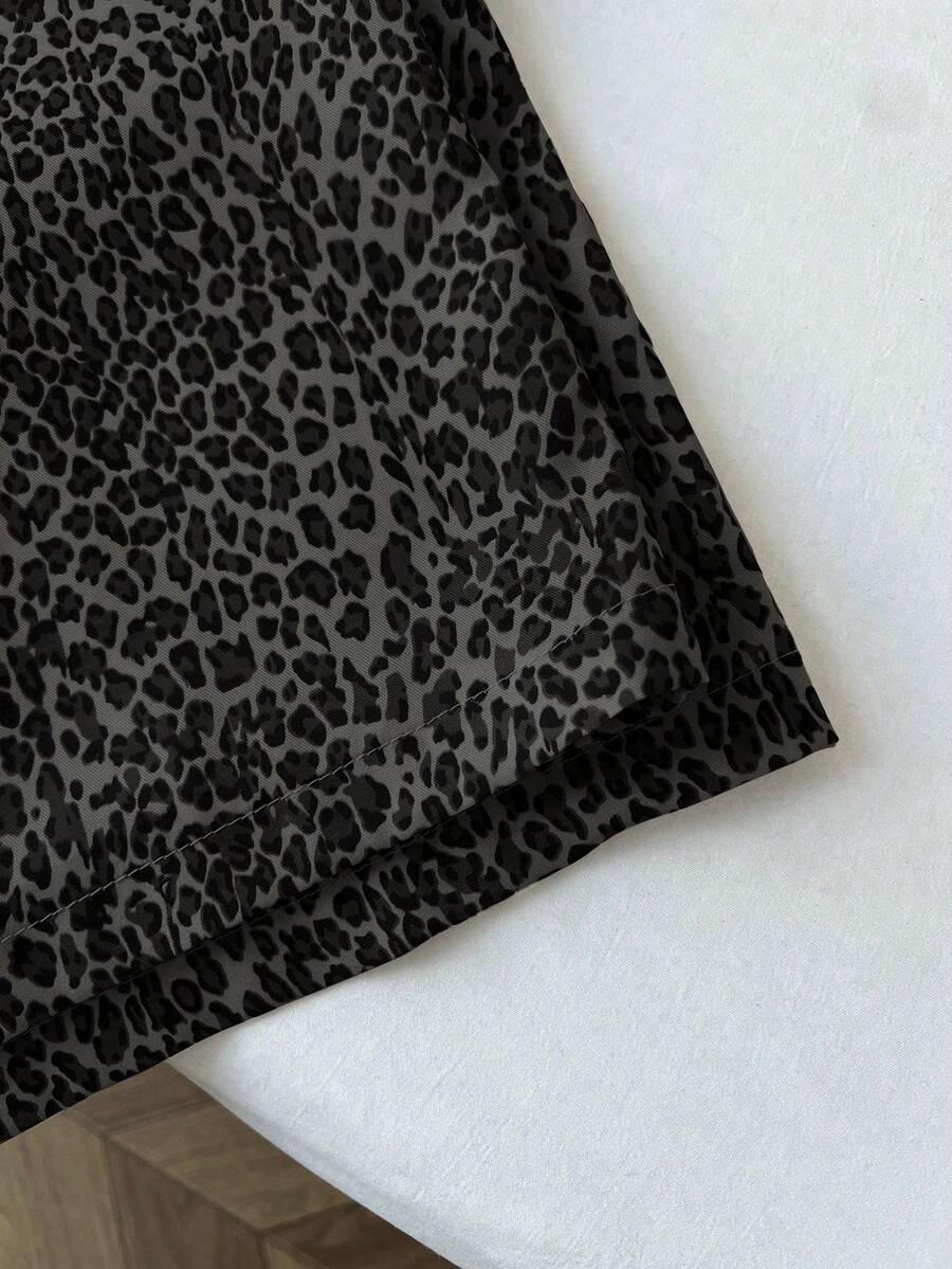 czarne spodnie animal print