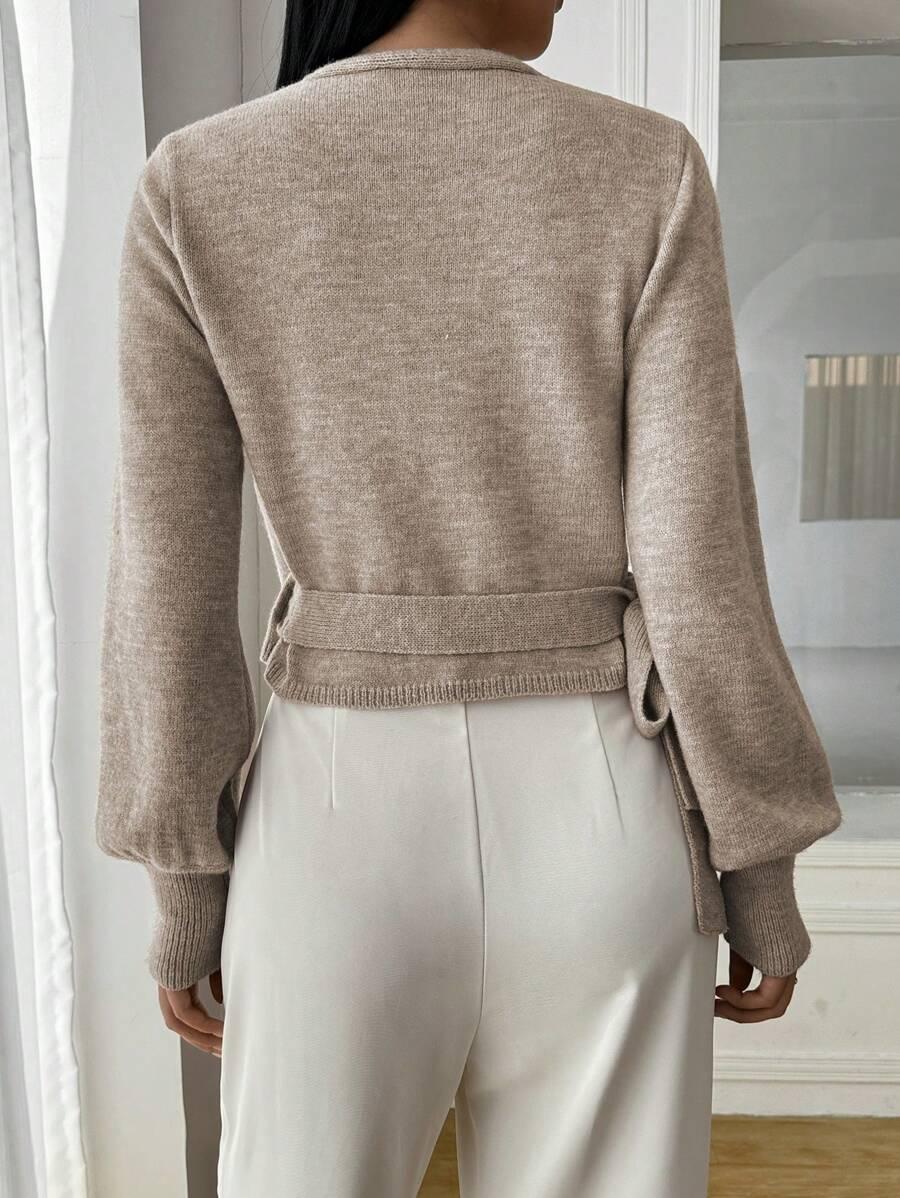BEŻOWY WIĄZANY SWETER 