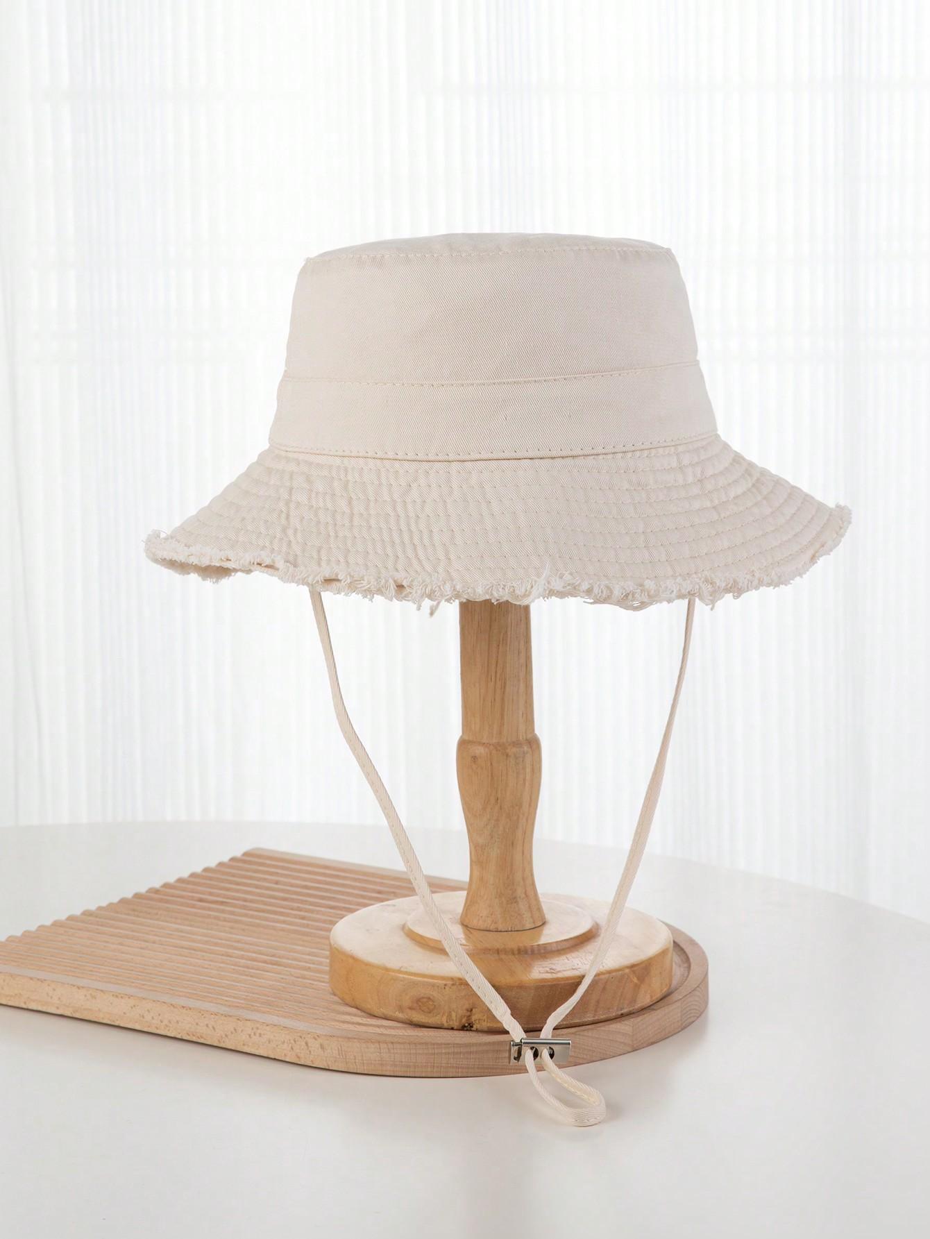 beżowy kapelusz bucket