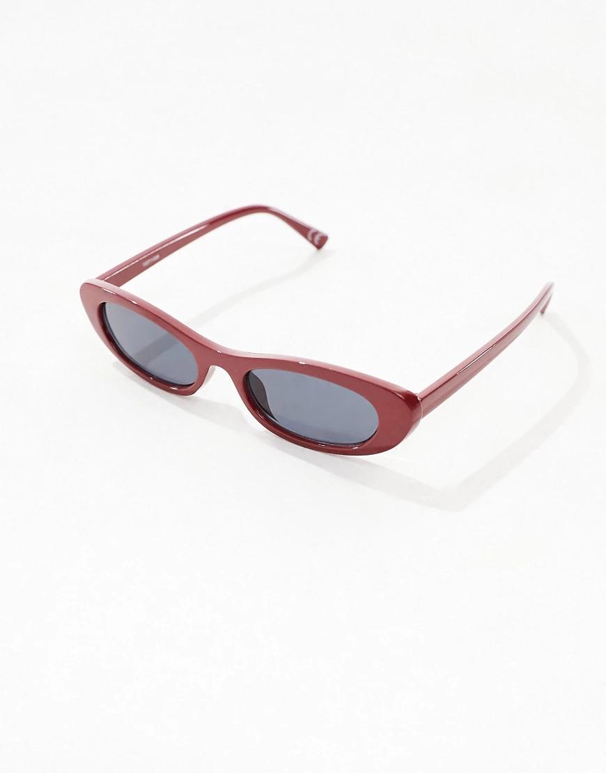 czerwone okulary przeciwsłoneczne w grubych oprawkach