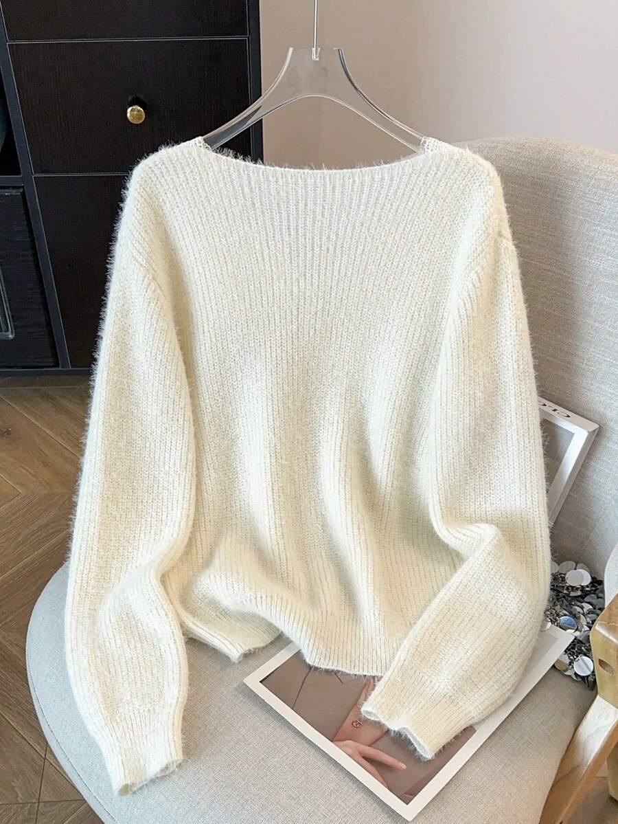 KREMOWY DZIANINOWY SWETER 