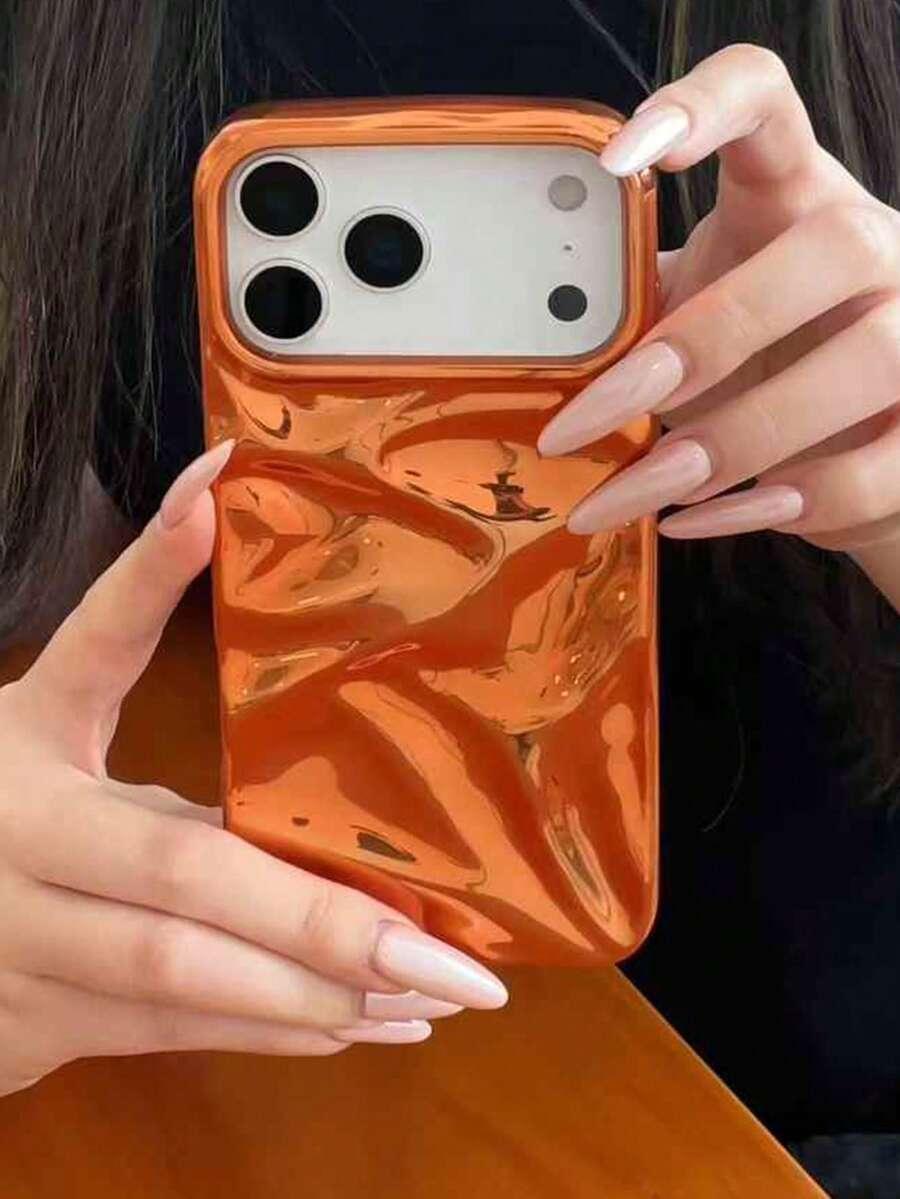 pomarańczowe etui na telefon 