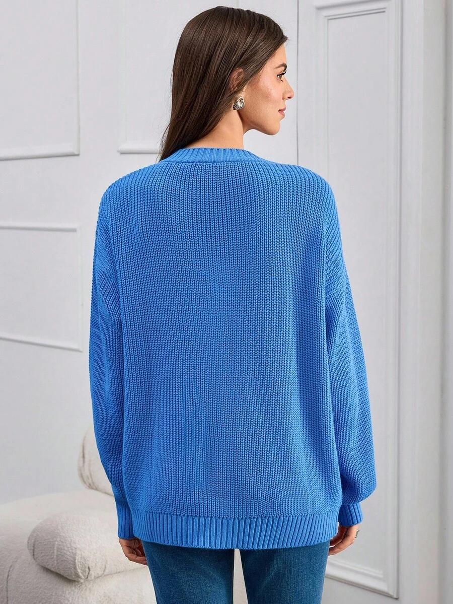 niebieski sweter v-neck