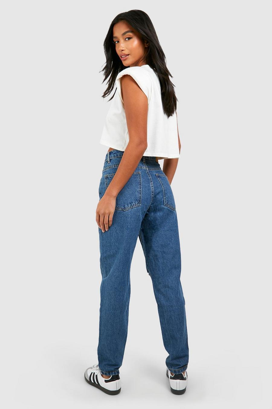 SPODNIE JEANS PRZETARCIA 
