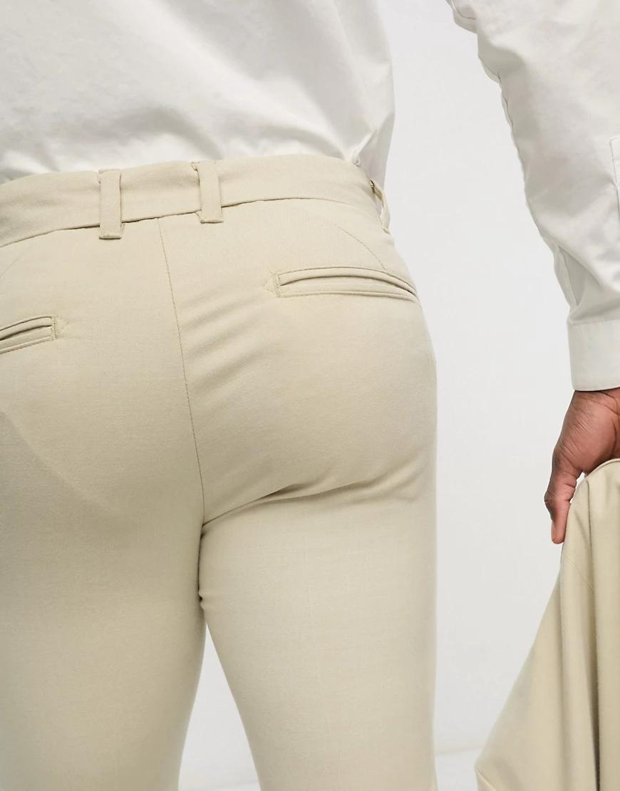 beżowe eleganckie spodnie skinny kieszenie