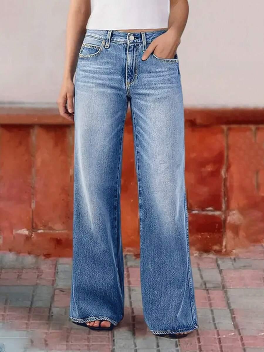 niebieskie spodnie jeans 