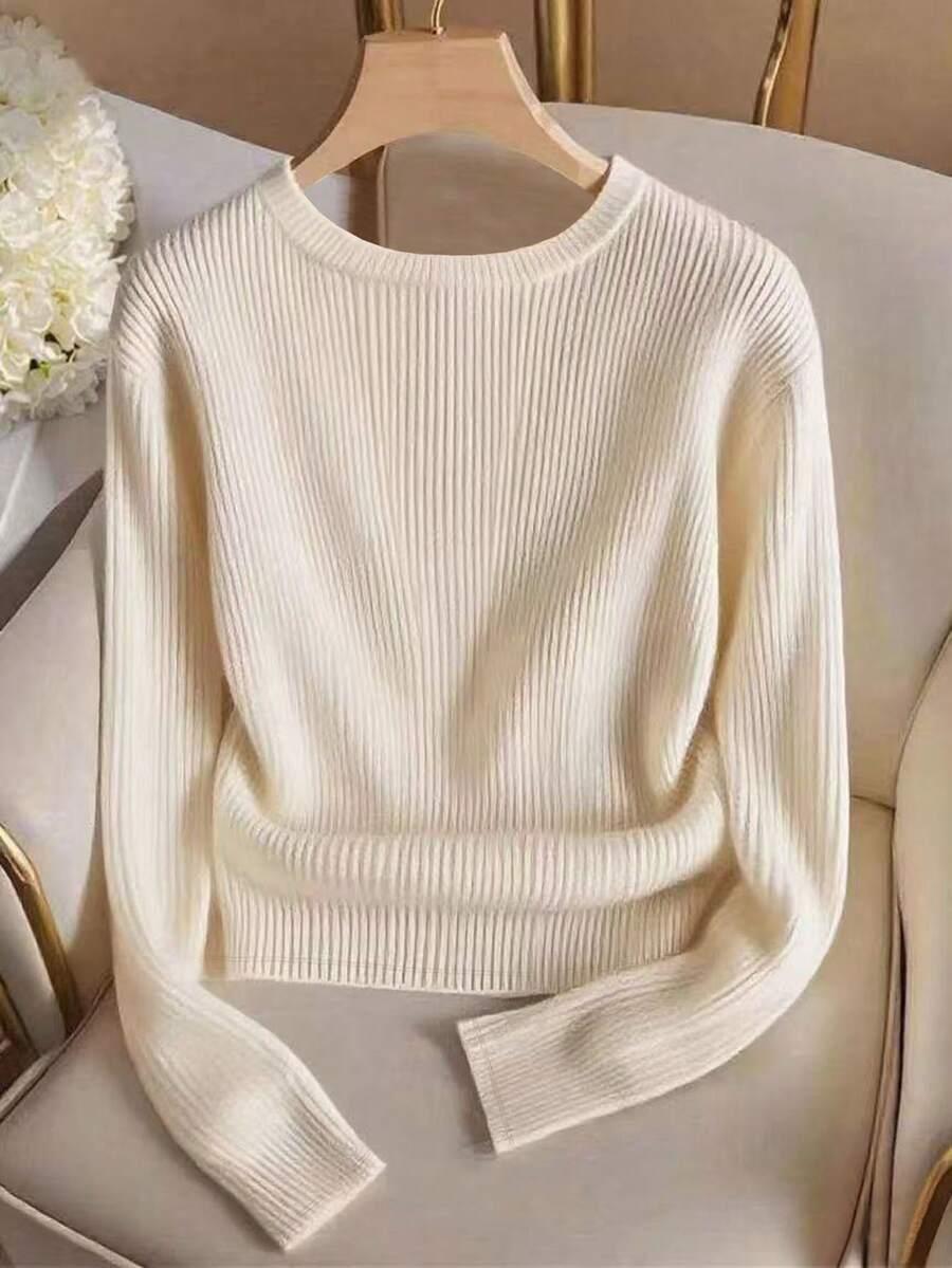 beżowy sweter prążki