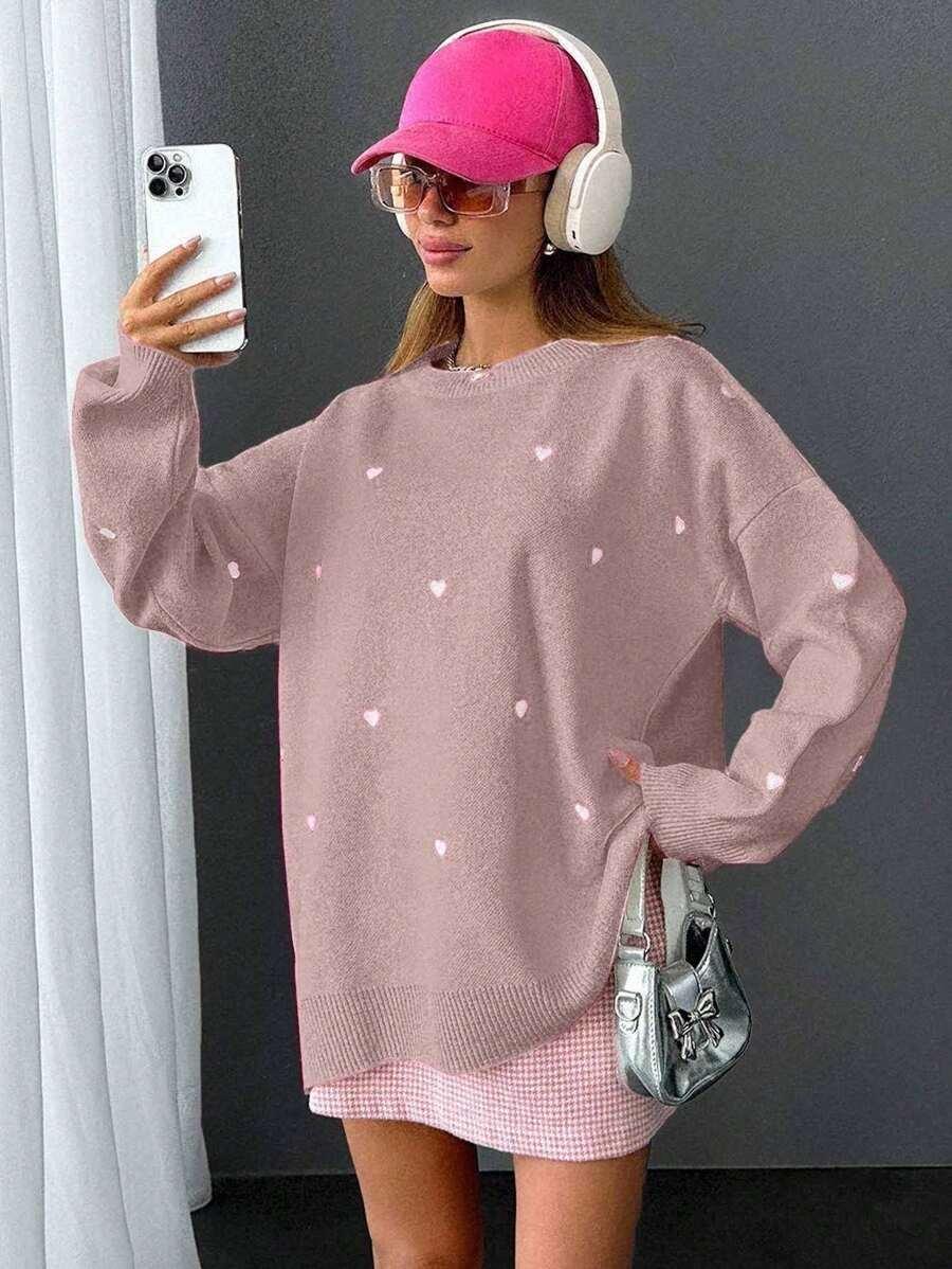 różowy sweter wzór serca