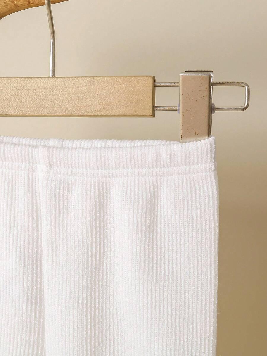 komplet sweter spodnie