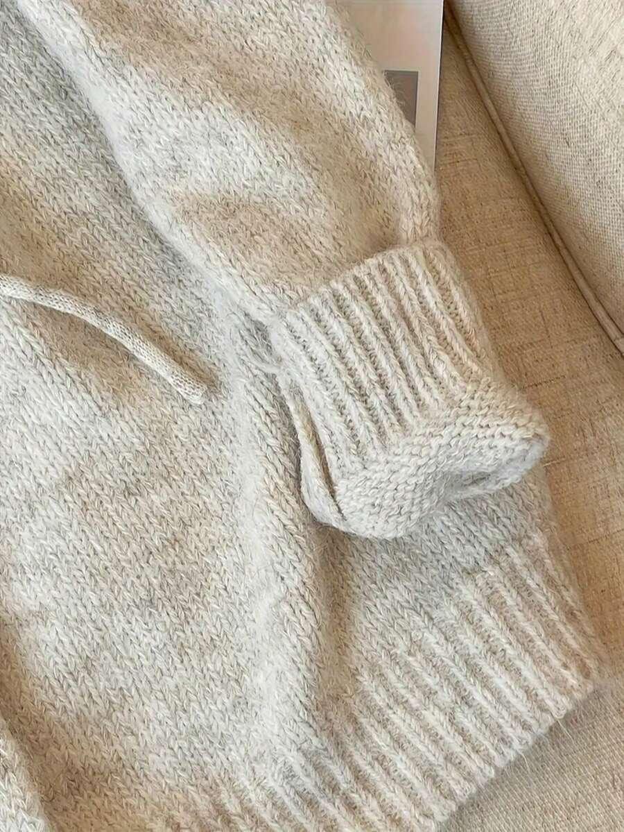 beżowy sweter kaptur