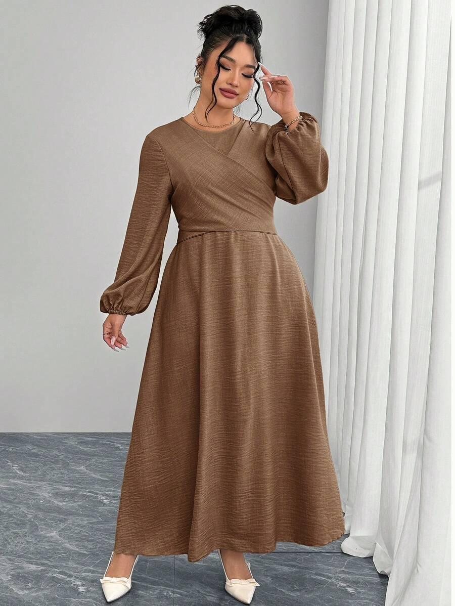 SUKIENKA PLUS SIZE ROZKLOSZOWANA MIDI DŁUGI RĘKAW