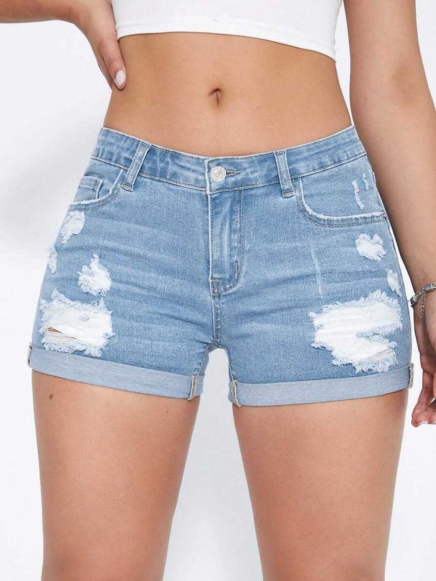niebieskie spodenki jeans przetarcia