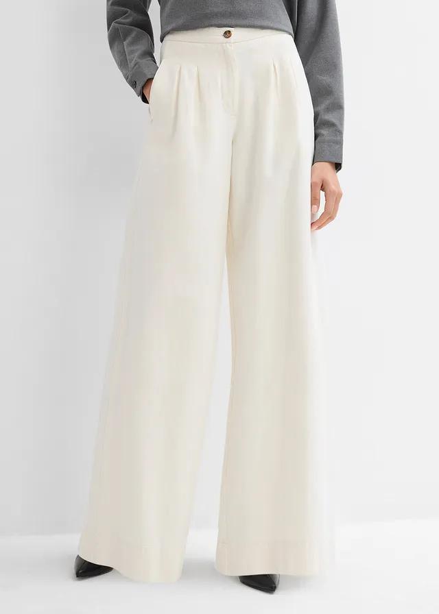 KREMOWE SPODNIE JEANS 