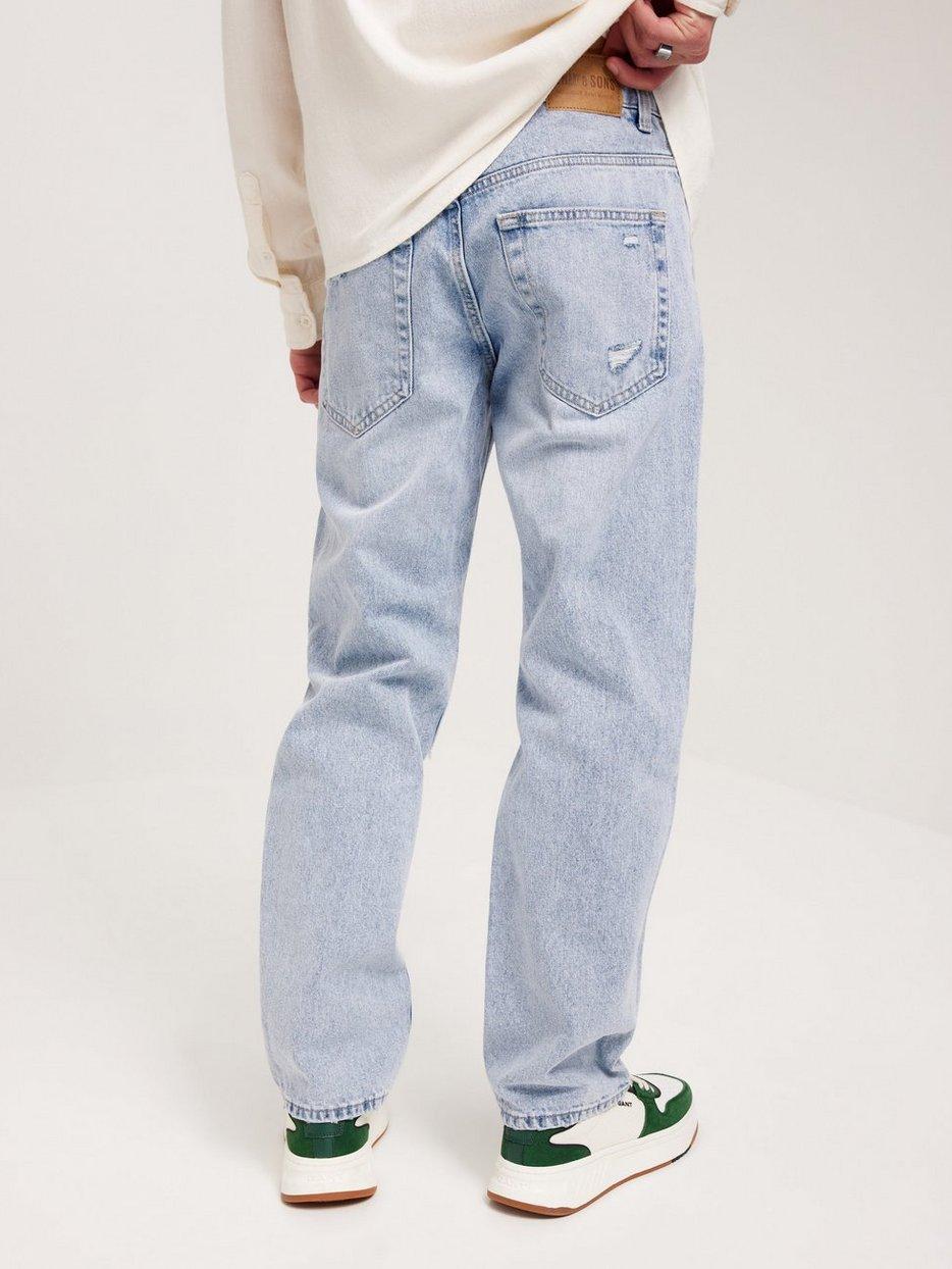spodnie jeans przetarcia dziury guziki