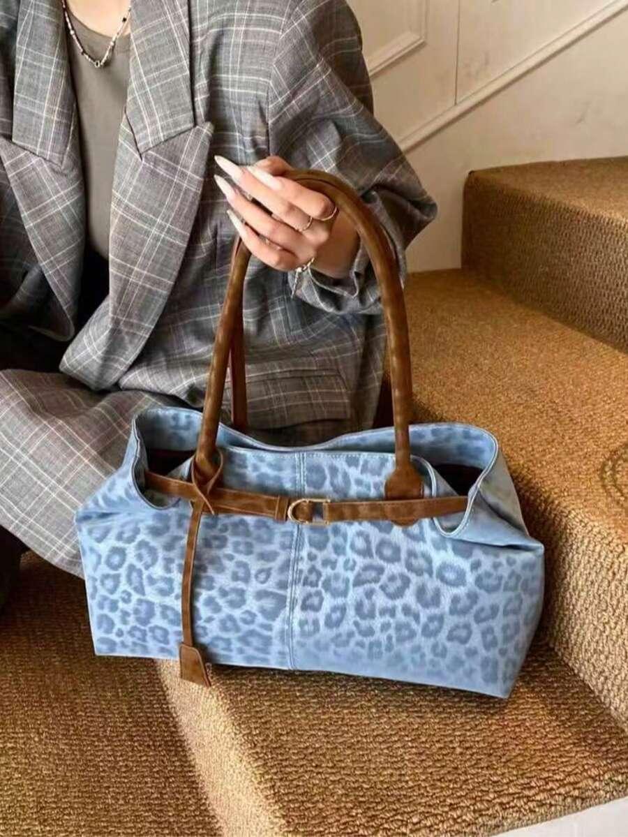 niebieska torebka leopard print
