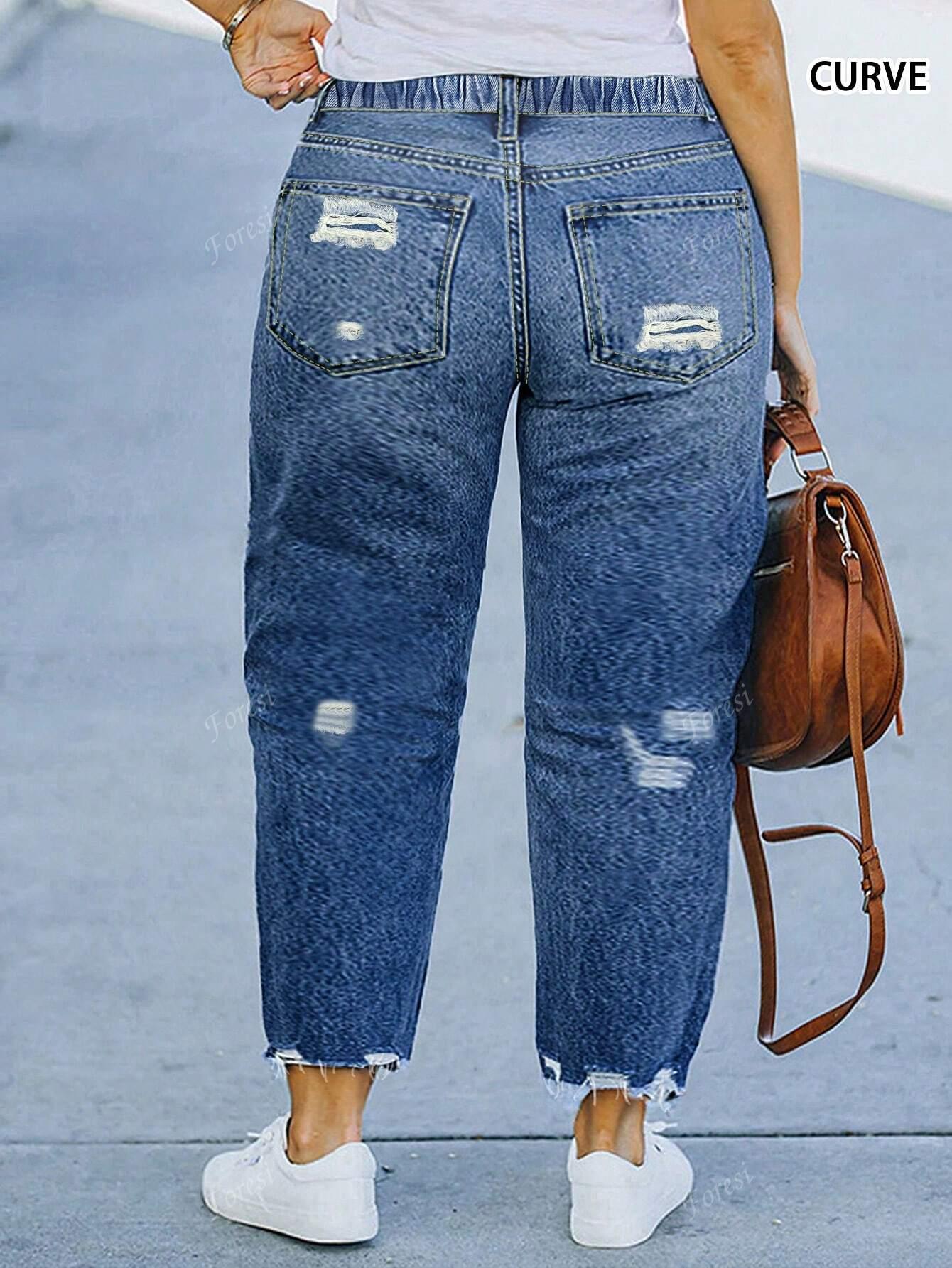 SPODNIE JEANS PRZETARCIA