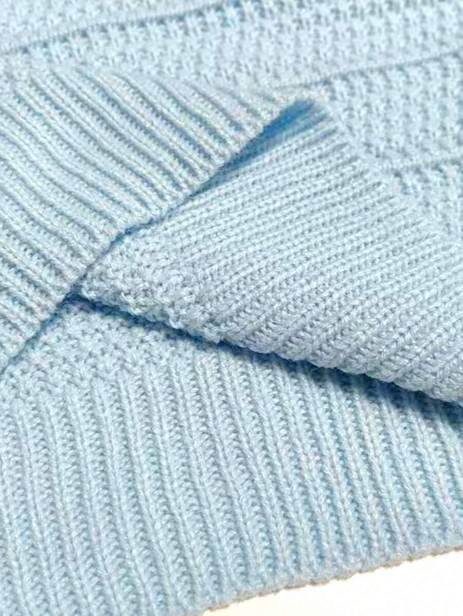 SWETER Z OZDOBNĄ KOKARDĄ