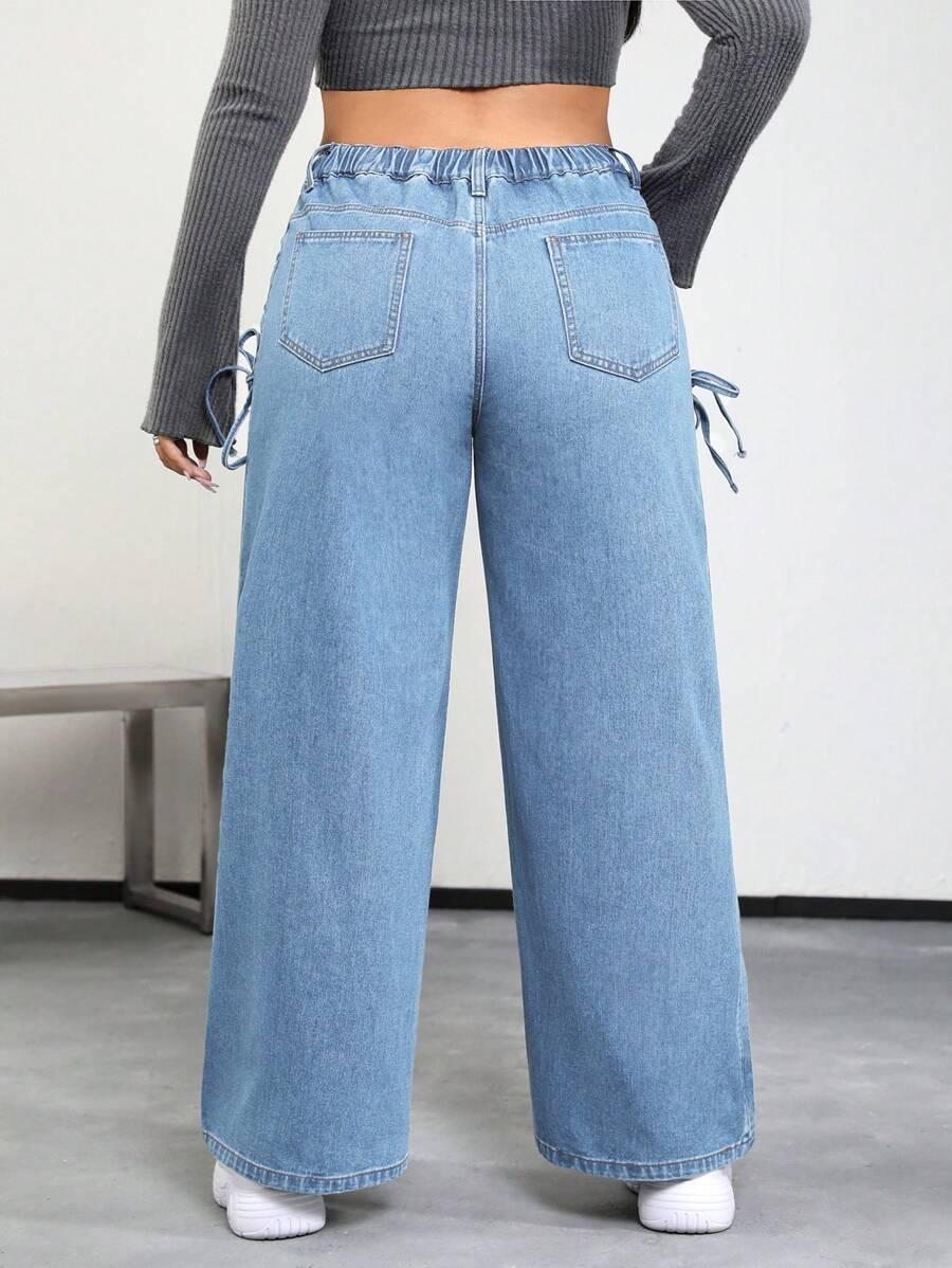 niebieskie spodnie jeans