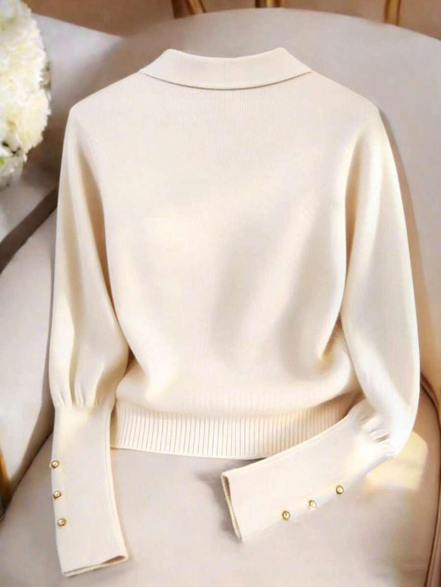 beżowy dzianinowy sweter