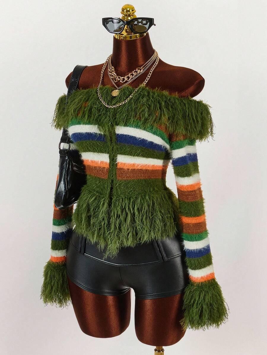 zielony sweter paski