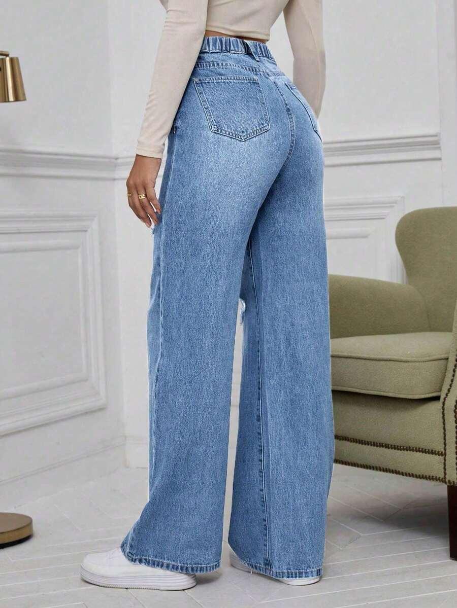 SPODNIE JEANS PRZETARCIA 