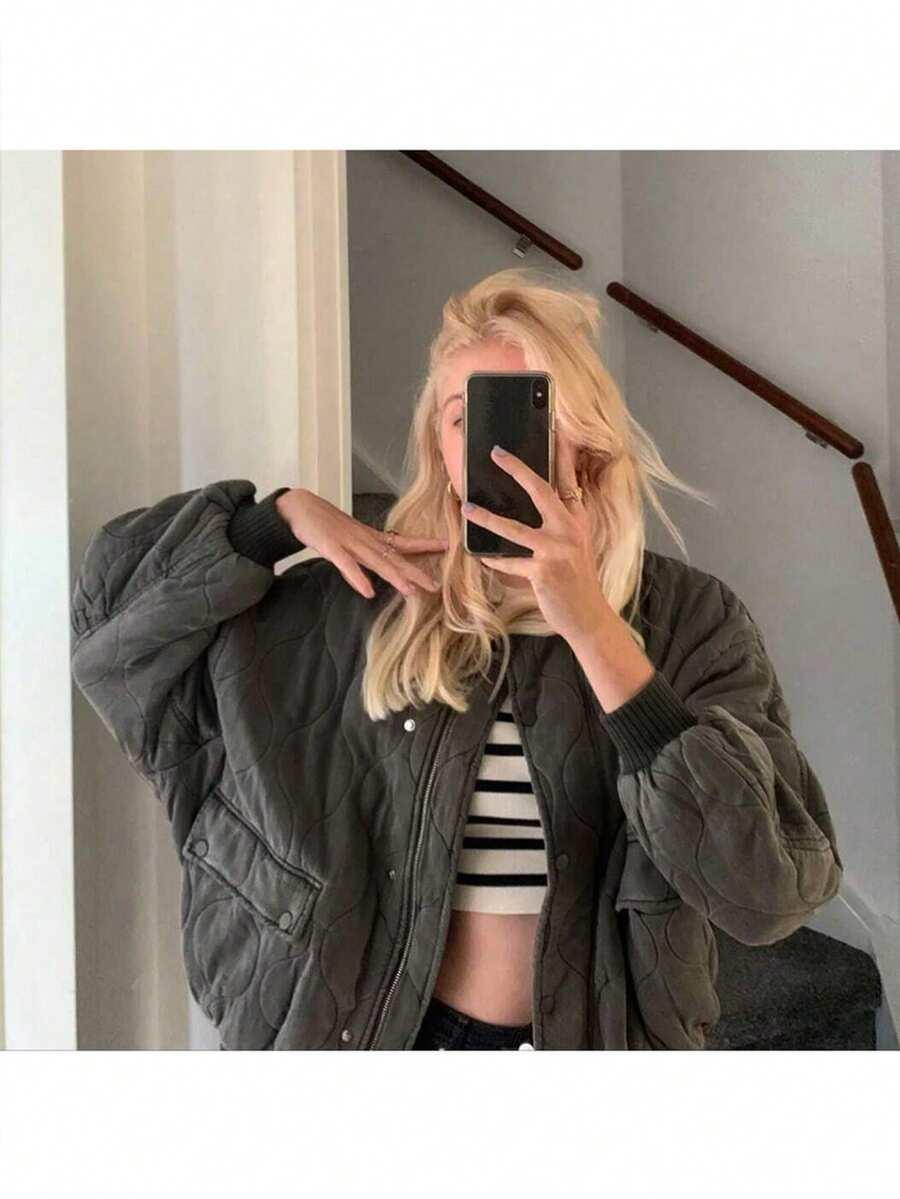 szara kurtka zamek