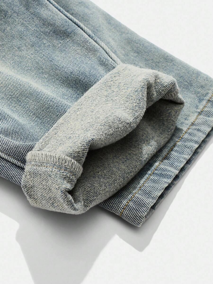 niebieskie spodnie jeans 