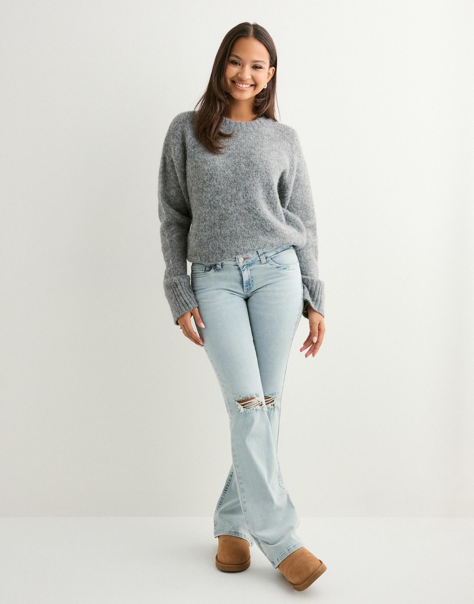 SPODNIE JEANS BOOTCUT DZIURY