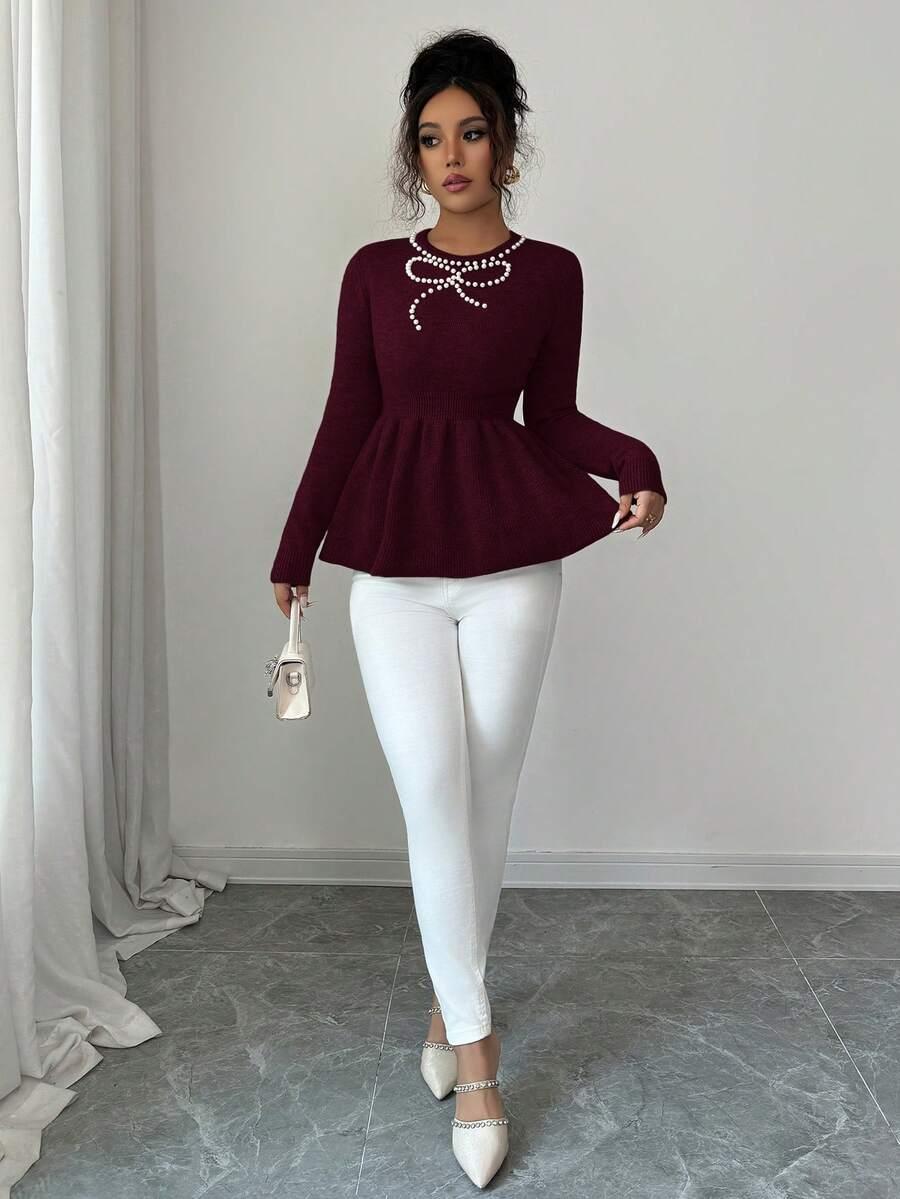 bordowy sweter zdobienie
