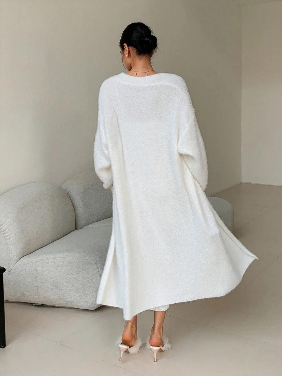 sweter narzutka wiązanie fluffy
