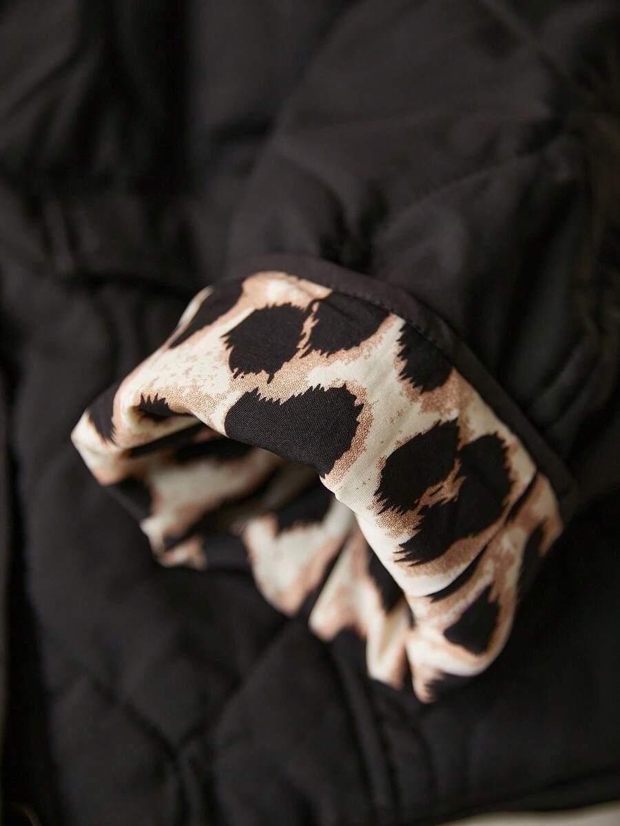 pikowana czarna kurtka animal print guziki