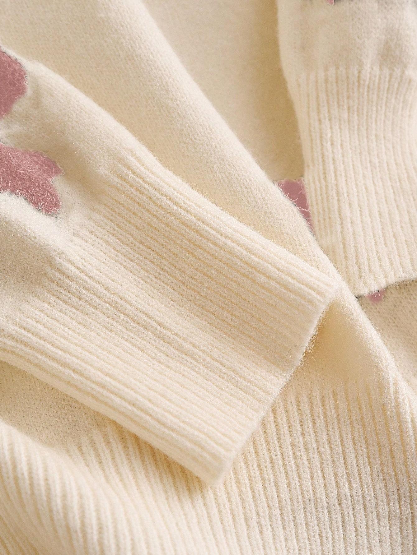 beżowy sweter kokardki