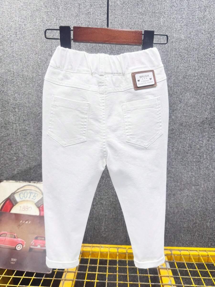 BIAŁE SPODNIE JEANS