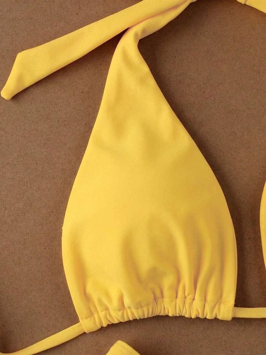 żółty dwuczęściowy strój kąpielowy