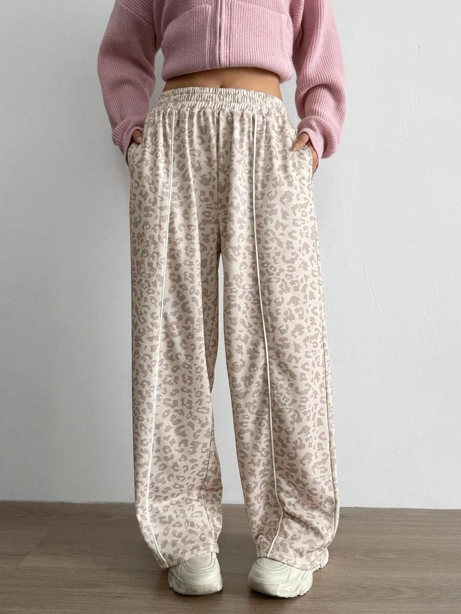 BEŻOWE SPODNIE DRESOWE ANIMAL PRINT