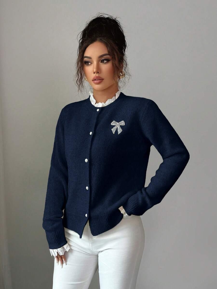 granatowy sweter długi rękaw