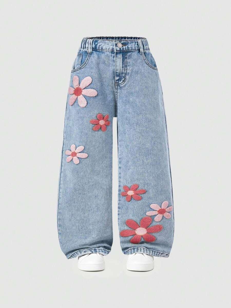 niebieskie spodnie jeans
