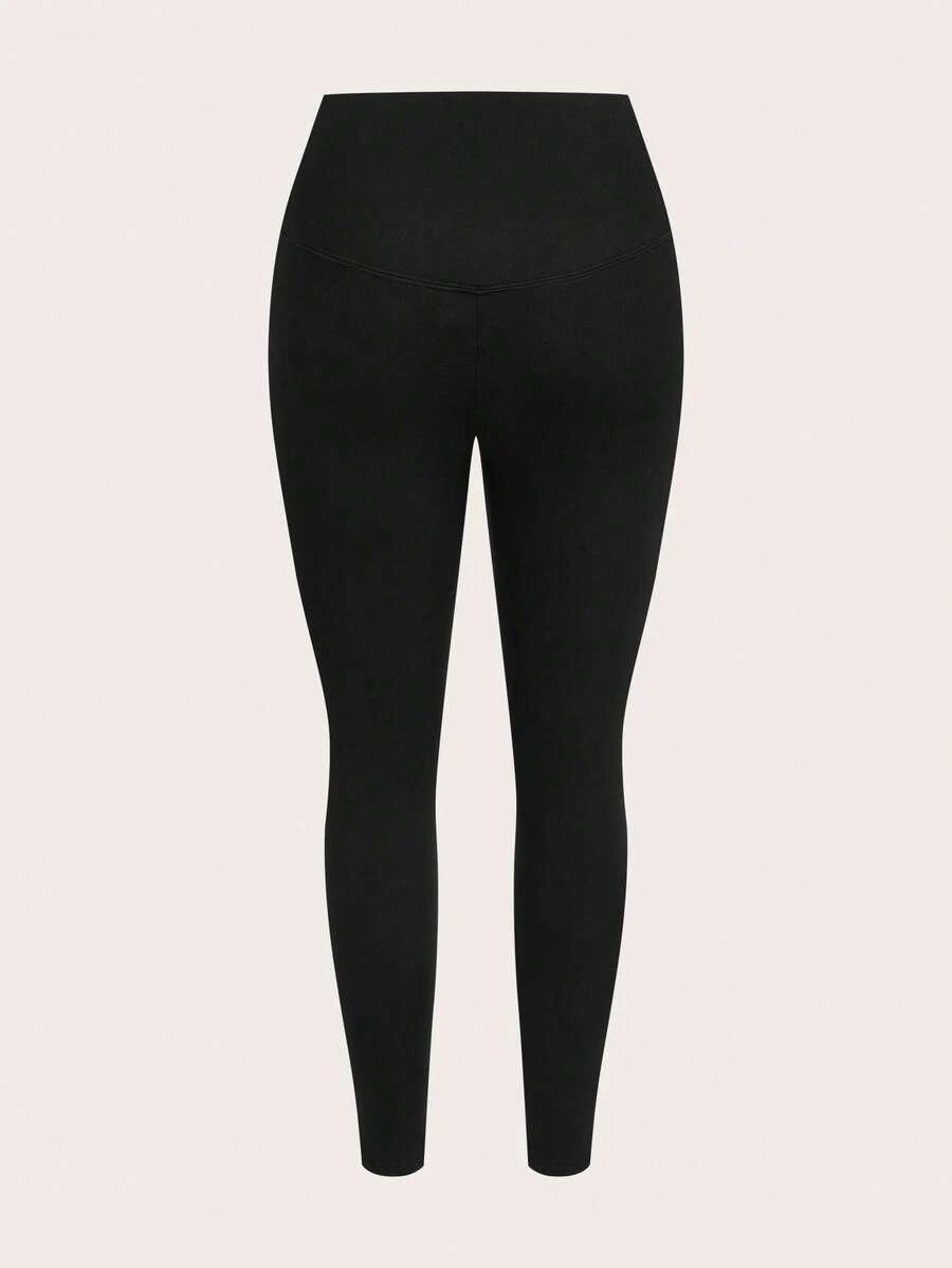czarne legginsy asymetria